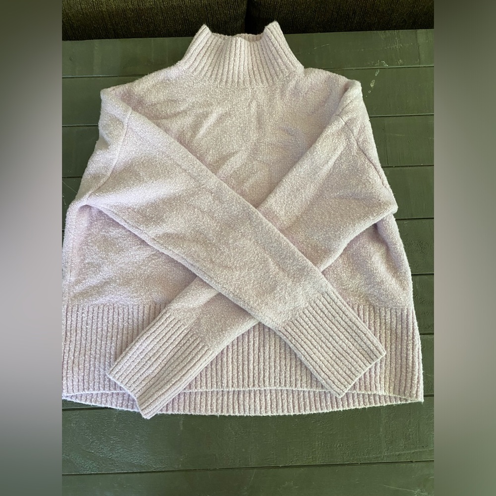 Light pink/lavender mix turtle neck sweater, never worn size XS.
